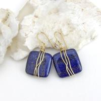 These natural lapis lazuli gemstone earrings have a simple, elegant chic and modern style that coordinates well with all wardrobe types. They are wire wrapped in gold brass wire and dangle from brass ear wires. Lightweight and comfortable to wear. They'll make a great gift for couples celebrating their 9th or 21st wedding anniversary. Brass is the traditional choice for a 21st anniversary and lapis is the gemstone for a 9th anniversary gift.