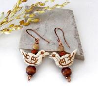 These handmade earrings feature creamy beige magnesite stone birds. They are accented with brown jasper, picture jasper, brown wood and tiny copper beads. Super cute, whimsical and fun to wear -- they'll make a great gift for a nature / bird lover! Your choice of ear wires - copper or hypoallergenic niobium.