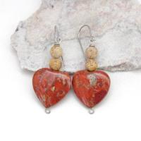 These handmade earrings feature heart shaped brecciated red jasper gemstones accented with beige picture jasper stones on surgical steel ear wires. This type of jasper has a brick red hue with natural inclusions. Full of romantic charm - they'll make a great gift for Valentine's Day, Mother's Day, a wedding anniversary, or simply to say "I love you".