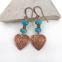 Small and petite, yet full of romantic charm - these handmade earrings feature small copper hearts with a hand stamped texture accented with blue turquoise stones and tiny copper beads. They'll make the perfect gift for someone special - a wonderful way to say "I love you" on Valentine's Day or any day! Makes a great gift for couples celebrating their 7th wedding anniversary - copper is the traditional choice for this occasion. Earrings are lightweight and comfortable to wear.