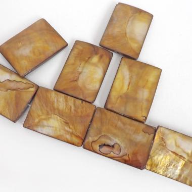Beautiful Golden Mother of Pearl beads for jewelry making. Nice large rectangular size for pendants measuring approx. 1-3/8" in length and 1" width. Drilled top to bottom. Total of 10 pieces. 